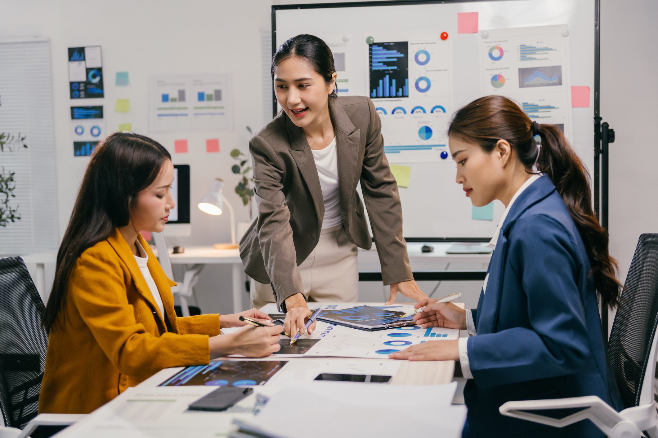 Colleagues planning project in conference room